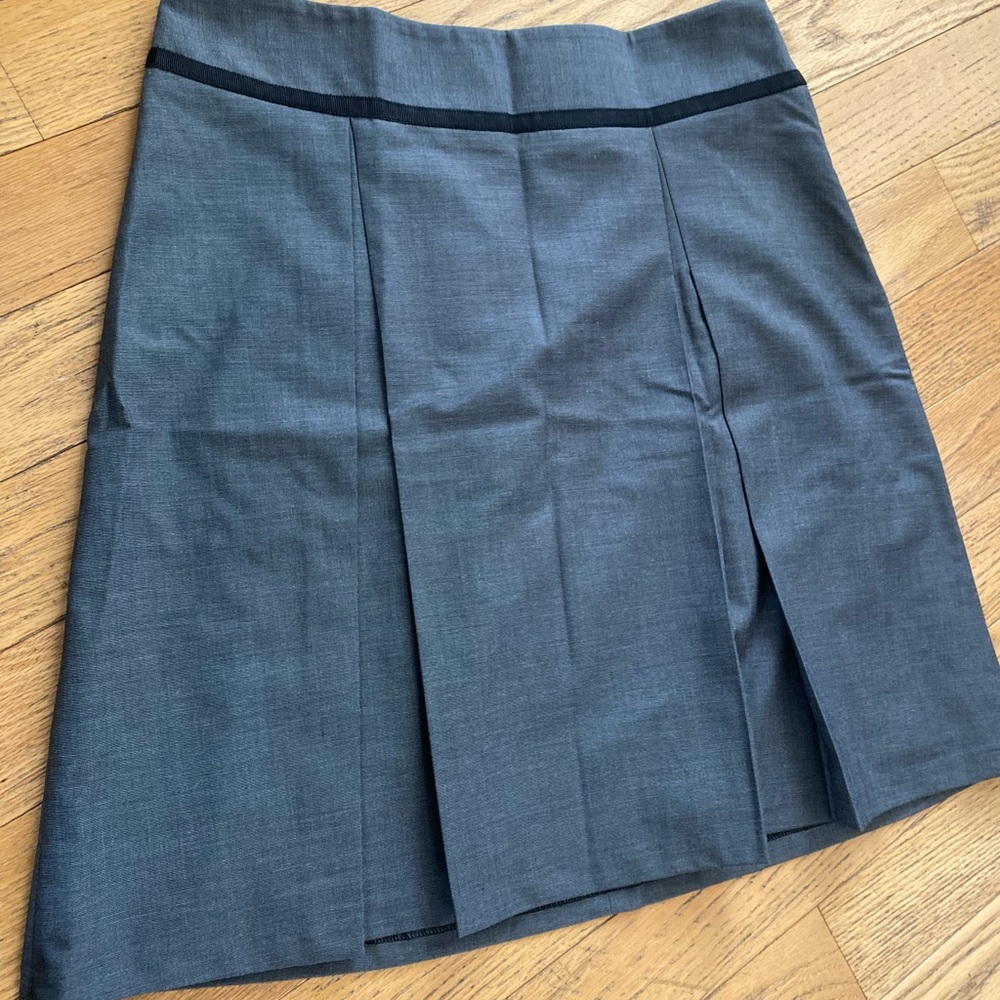 The limited mid length dark gray skirt size L